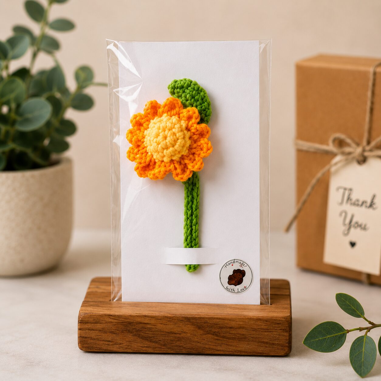 Handmade crochet marigold bookmark with colorful floral design and green leaf - Image 3