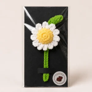 Handmade crochet daisy bookmark with braided stem and floral page marker