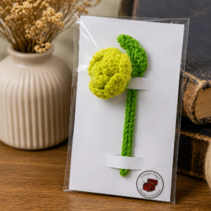 Handmade crochet yellow flower bookmark with braided stem and floral design