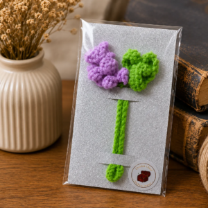 Handmade crochet flower bookmark with braided stem and cute floral design